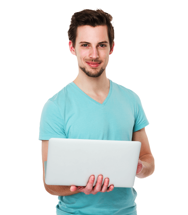 A man in a light blue t-shirt holding a laptop and smiling